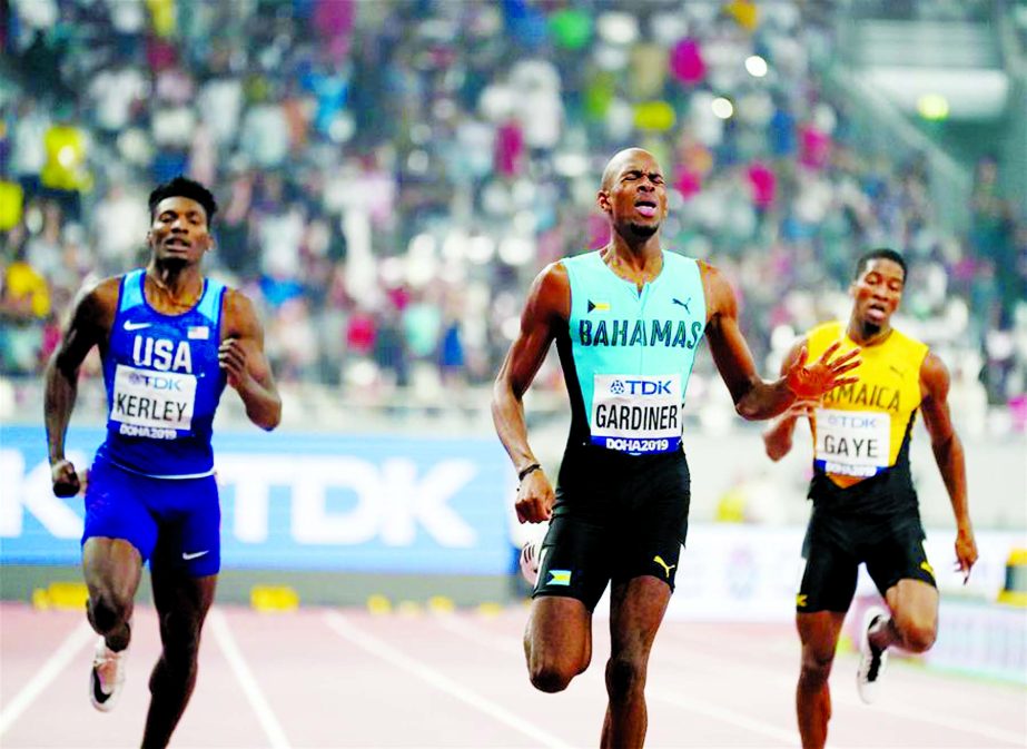 Steven Gardiner (center) of Bahamas competes during the men's 400 meter final at the 2019 IAAF World Athletics Championships in Doha, Qatar on Friday.