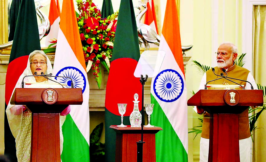 Prime Minister Sheikh Hasina addressing at a joint media conference after the bilateral talks with her Indian counterpart Narendra Modi at the Hyderabad House in New Delhi on Saturday. PID photo