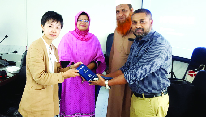 MYMENSINGH: Dr Midori Iida, Associate Professor of Niigata University Japan receiving souvenir after delivered her keynote speech at the seminar on Early Migratory Ecology of Japanese Gobid Fishes at Fisheries Faculty Conference Room of Bangladesh Agricu