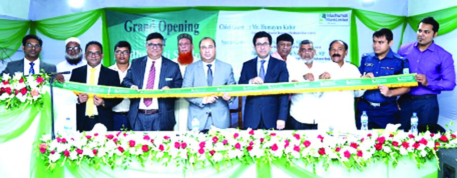 Humayun Kabir, Chairman of Board of Directors of Modhumoti Bank Limited, inaugurating its 39th branch at Saidpur in Nilphamari recently. Barrister Sheikh Fazle Noor Taposh, MP, EC Chairman of the bank and local elites were also present.