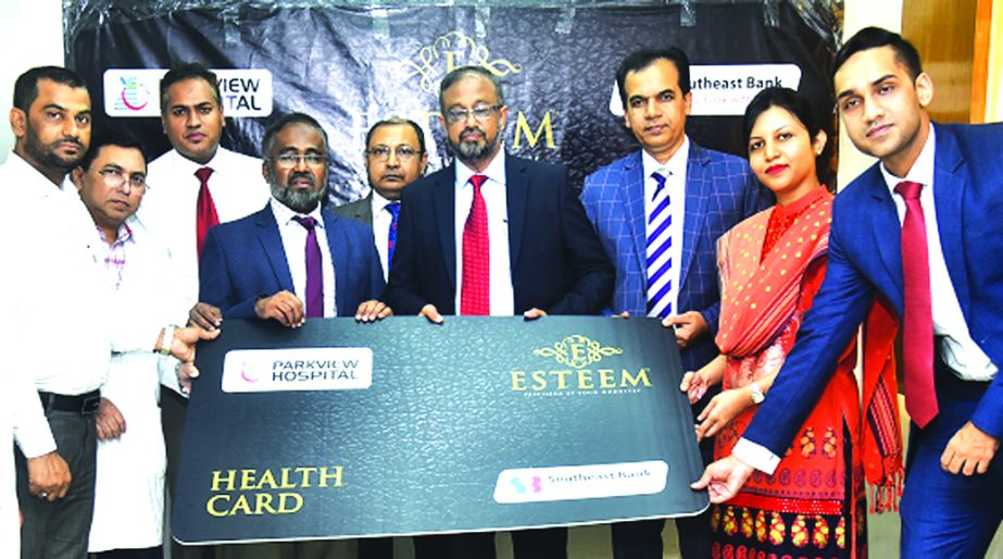 Anwar Uddin, Deputy Managing Director of Southeast Bank Limited, poses for photograph along with Dr ATM Rezaul Karim, Managing Director of Parkview Hospital Limited, after signing an agreement at the hospital recently. Under the deal, Parkview Hospital wi