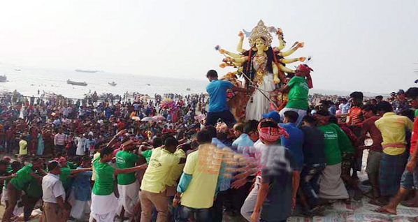Bijoya Dashami celebrated following the immersion of Goddess Durga at Patenga Sea Beach yesterday evening.