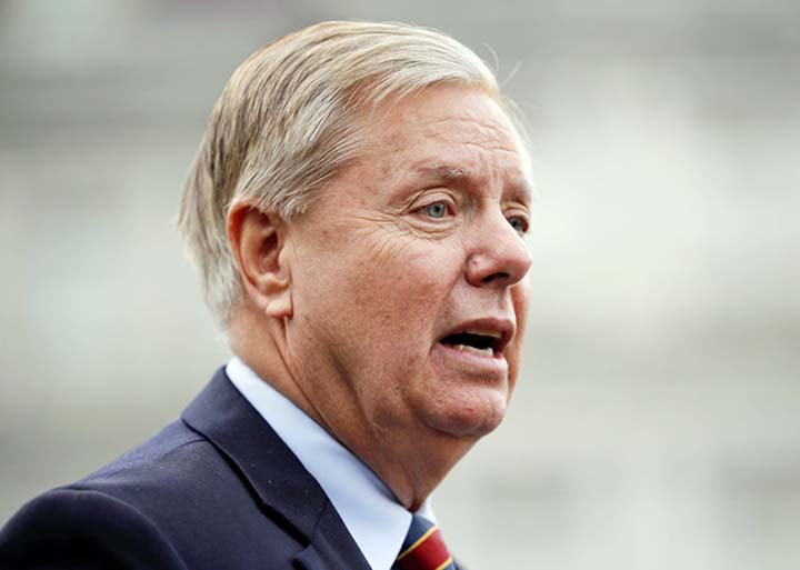 Senate Judiciary Committee Chairman Lindsey Graham, R-S.C., takes questions from reporters following a closed-door briefing on Iran, at the Capitol in Washington on Wednesday
