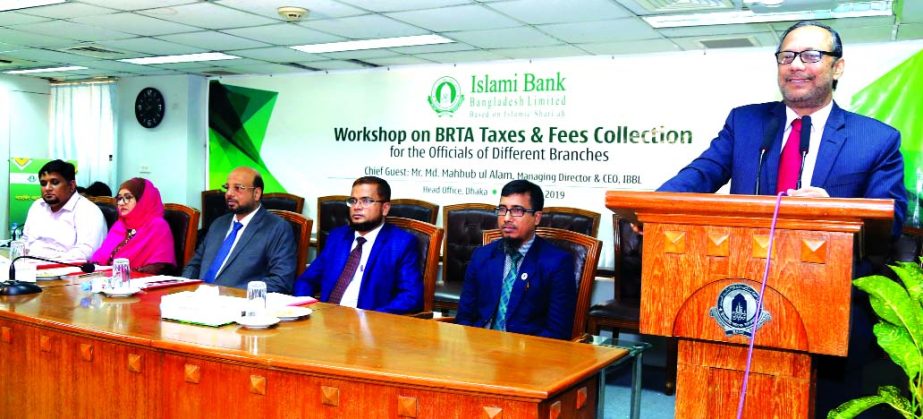 Md Mahbub ul Alam, Managing Director of Islami Bank Bangladesh Limited, speaking at a workshop on "BRTA Taxes & Fees Collection Procedure" at the bank's head office in the city recently. Abu Reza Md. Yeahia, DMD and Md Mizanur Rahman Bhuiyan, Head of B
