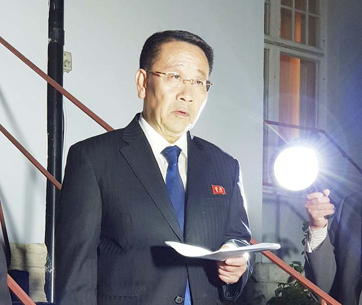 North Korean negotiator, Kim Miyong Gil speaks outside the North Korean Embassy in Stockholm, Sweden on Saturday.