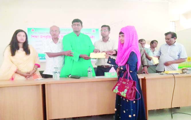 SUNDARGANJ (Gaibandha): Barrister Shameem Haider Patwari MP and Soliaman Ali, UNO distributing stipend among the disabled students at Saghata Upazila organised by Sundarganj Upazila Social Welfare Directorate recently.