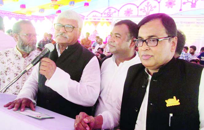 SATHIA (Pabna ): Advocate Shamsul Haq Tuku , Chairman, Parliamentary Standing Committee on Ministry of Home Affairs speaking as Chief Guest at the conference room of Sathia Upazila Jubo League yesterday.