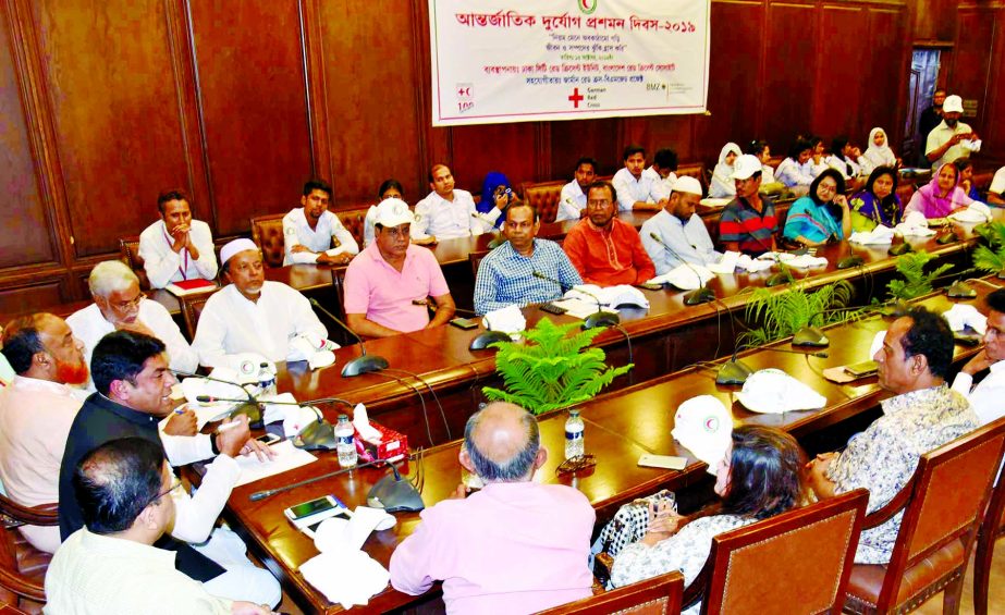 Acting DSCC Mayor Hasibur Rahman Manik speaking at a joint meeting of Bangladesh Red Crescent Society and Dhaka South City Corporation at Nagar Bhaban in the city marking the International Day for Disaster Reduction yesterday.