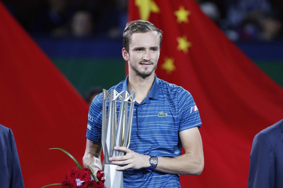 Daniil Medvedev of Russia, celebrates with the trophy after winning against Alexander Zverev of Germany, during their men's final at the Shanghai Masters tennis tournament at Qizhong Forest Sports City Tennis Center in Shanghai, China on Sunday.