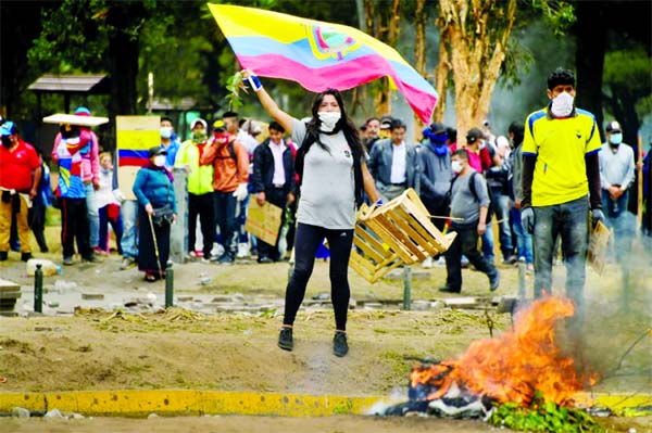 Demonstrators set up barricades near the National Assembly of Ecuador capitals in Quito.