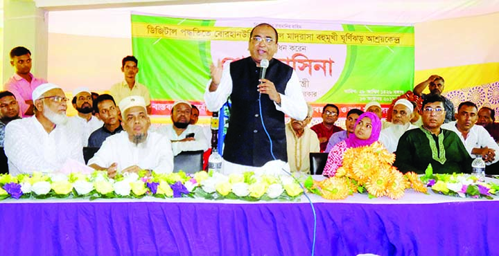 BHOLA: Ali Azam Mukul MP speaking at the inaugural prgramme of cyclone centre at Borhanuddin Kamil Madrasa at Borhanuddin Upazila as Chief Guest yesterday.