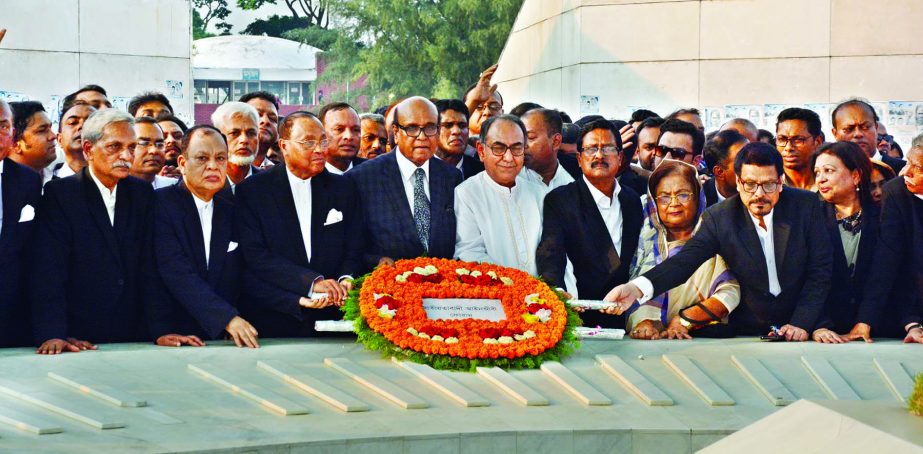 Newly formed Convening Committee of Bangladesh Ainjibi Forum placing floral wreaths on the Mazar of Shaheed President Ziaur Rahman in the city on Tuesday. Convener of the committee Advocate Khondkar Mahbub Hossian was present, among others, on the occasio