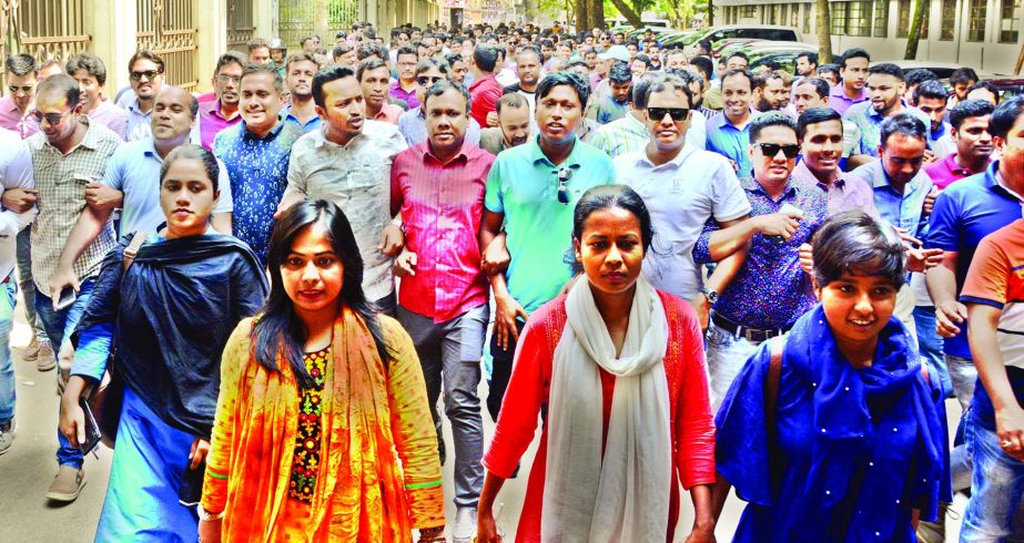 Jatiyatabadi Chhatra Dal brought out a silent procession on Dhaka University campus on Thursday demanding trial of killers of Abrar Fahad and release of BNP Chief Begum Khaleda Zia.