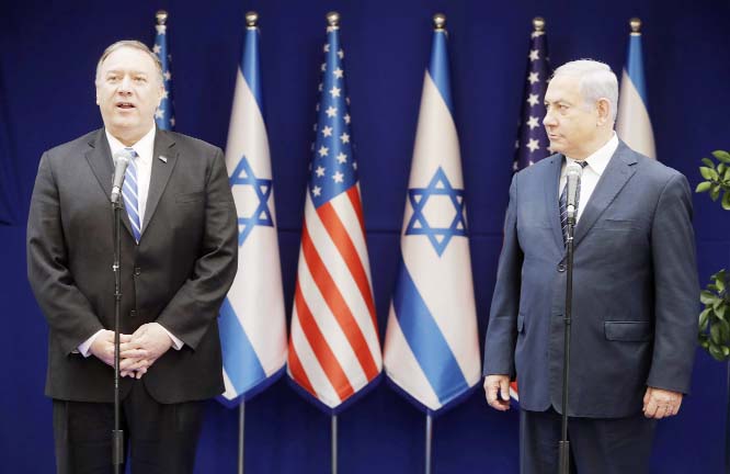 U.S. Secretary of State Mike Pompeo, left, and Israeli Prime Minister, Benjamin Netanyahu, stand during statements to the press during a meeting at the Prime Minister's residence in Jerusalem on Friday.