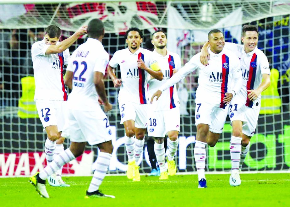 PSG's Kylian Mbappe (2nd from right) celebrates his goal during the French League One soccer match between Nice and Paris Saint Germain in Allianz Riviera stadium in Nice, southern France on Friday.