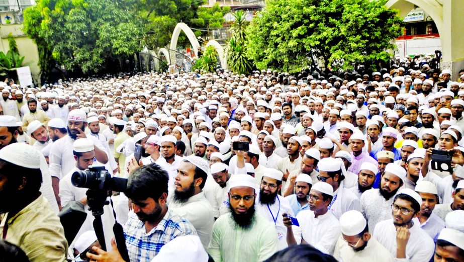 Members of Hefazat-e-Islam Bangladesh held a rally in front of Dhaka's Baitul Mukarram National Mosque on Tuesday protesting against the Bhola clash, which left four people dead.