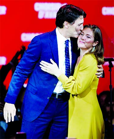 Canadian Prime Minister Justin Trudeau celebrated with his wife Sophie Gregoire after his Liberal Party was declared winners or leading in a majority of the nation's electoral districts.