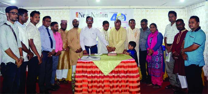 SYLHET: Mokabbir Khan MP cutting cake in observance of the 40th founding anniversary of The New Nation at a hotel in Sylhet organised by Sylhet Bureau Office on Monday.