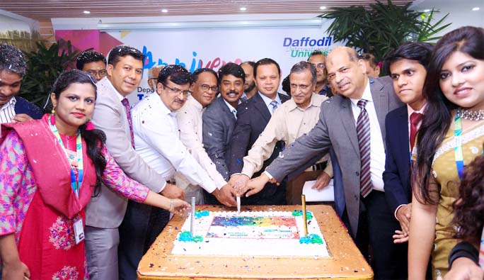 Dr Md. Sabur Khan, Chairman, Daffodil International University along with its Vice Chancellor Prof Dr Yousuf Mahbubul Islam cutting cake marking celebration of 6th Anniversary of Tourism & Hospitality Management Department of the University on Monday.
