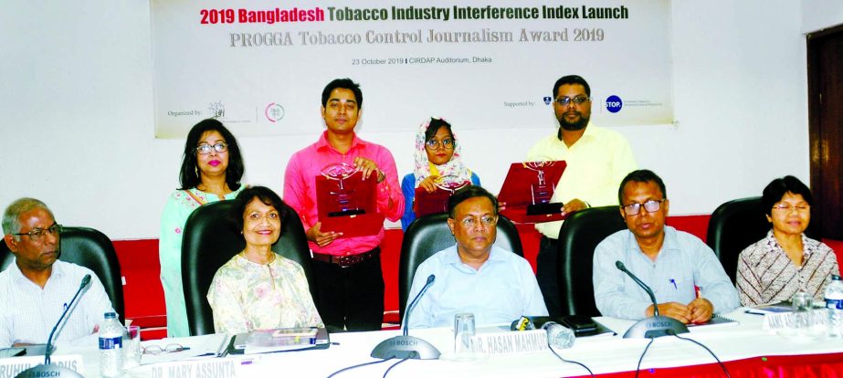 Information Minister Dr Hasan Mahmud, among others, at the Tobacco Control Journalism Award giving ceremony organised jointly by Progga and Anti Tobacco Media Alliance in CIRDAP auditorium in the city on Wednesday.