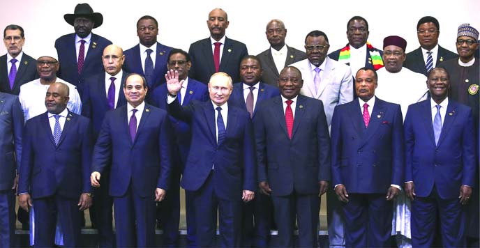 Russian President Vladimir Putin,( center) , poses for a photo with leaders of African countries at the Russia-Africa summit in the Black Sea resort of Sochi, Russia, on Thursday.