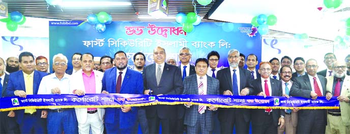 Syed Waseque Md Ali, Managing Director of First Security Islami Bank Limited, inaugurating its corporate branch at city's Gulshan-1 area on Thursday. Abdul Aziz, AMD, Md. Mustafa Khair, Md. Zahurul Haque, DMDs, high officials of the bank and local elites