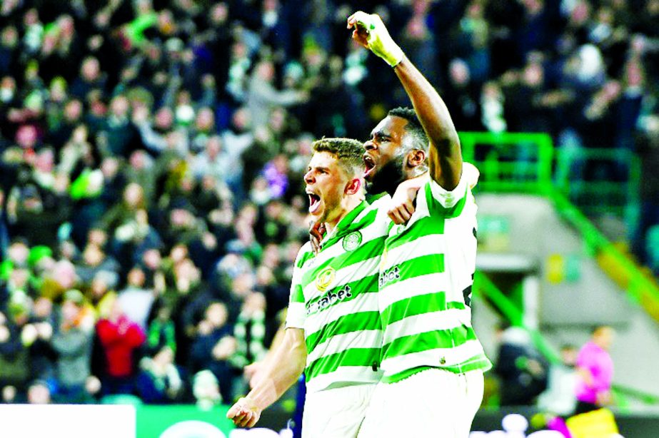 Odsonne Edouard (right) and Ryan Christie (left) celebrate Celtic's equaliser against Lazio in their UEFA Europa League football match on Thursday.