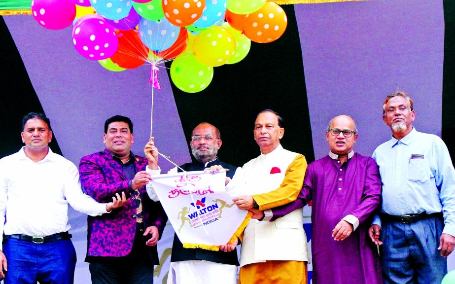 Minister for Housing and Public Works SM Rezaul Karim inaugurating the National Junior Athletics Competition by releasing the balloons as the chief guest at the Bangabandhu National Stadium on Friday.