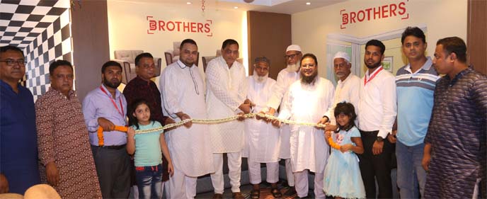 Elias Sarker, Managing Director of Brothers' Furniture Limited, inaugurating its new showroom at city's Khilgaon area recently. Sharifuzzaman Sarker, Director, Mohammad Monirul Islam Bokshi, head of marketing and sales of the company and local elites we