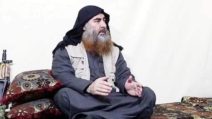 This image made from video posted on a militant website , April 29, 2019, purports to show the leader of the Islamic State group, Abu Bakr al-Baghdadi, being interviewed by his group's Al-Furqan media outlet.