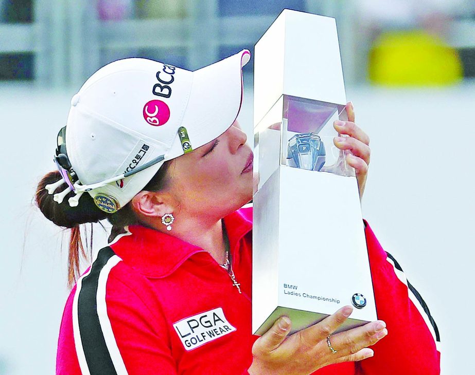 Ha Na Jang of South Korea kisses her trophy after winning the LPGA's BMW Ladies Championship at LPGA International Busan in Busan, South Korea on Sunday.