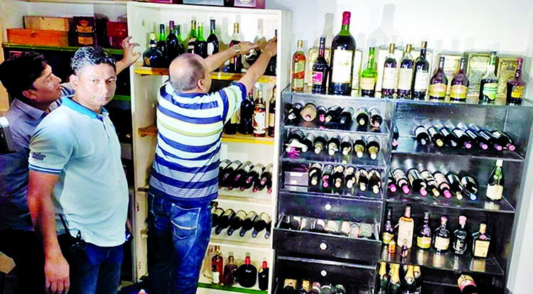 Anti-narcotics team raided on controversial industrialist Aziz Mohammad Bhai's Gulshan house and seized stockpile of alcohol and casino equipment on Sunday.