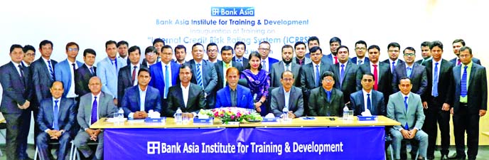 Md. Sazzad Hossain, DMD of Bank Asia Limited, poses for photograph with the participants of a day-long workshop on "Internal Credit Risk Rating System (ICRRS)" for 35 officers of different ranks from Internal Control & Compliance Division (ICCD) at the