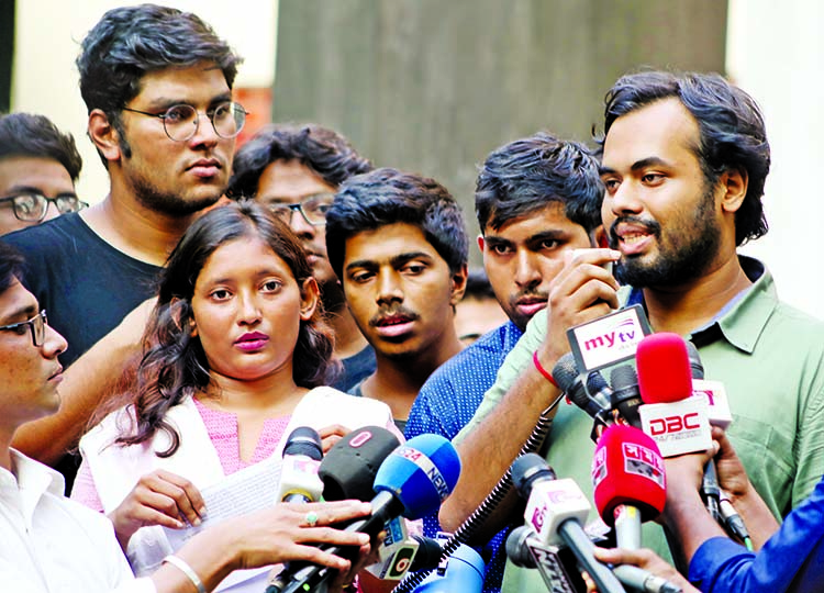 BUET students announcing their next programme at BUET Shahid Minar on Tuesday.