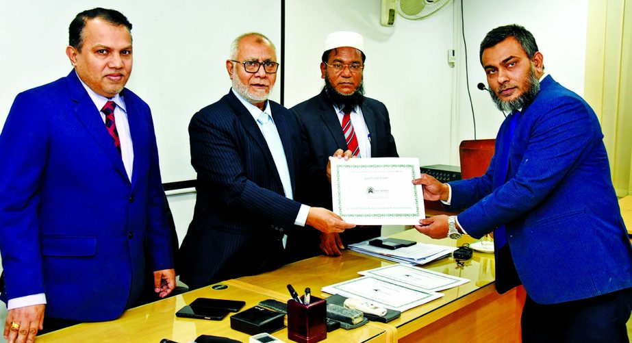 Md. Fazlul Karim, Managing Director (CC) of Al-Arafah Islami Bank Limited, handing over the certificate at the closing ceremony of 3-day training course on 'Financial Statement Analysis and Working Capital Need Assessment' at the bank's Training and Re