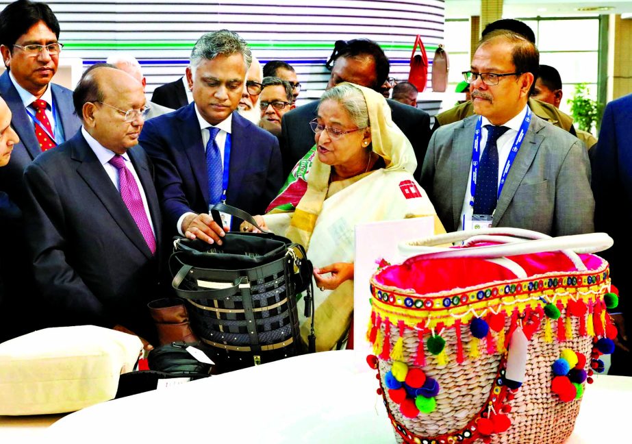 Prime Minister Sheikh Hasina visiting a stall after inaugurating the third edition of Bangladesh Leather Footwear and Leathergoods International Sourcing Show (BLLISS), 2019 at Bangabandhu International Conference Centre (BICC) on Wednesday.