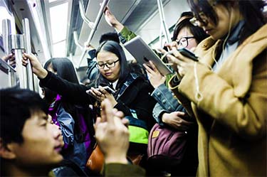 The city plans to install cameras that will scan the faces of passengers as they enter a subway station in Beijing according to a transport official. Internet photo