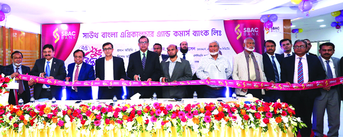 S M Amzad Hossain, Chairman of South Bangla Agriculture & Commerce (SBAC) Bank Limited, inaugurating its 75th branch at Babubazar in the city on Wednesday. Md. Golam Faruque, CEO, Mohammad Nawaz, Md. Anwar Hossain, Directors, Mostafa Jalal Uddin Ahmed, AM