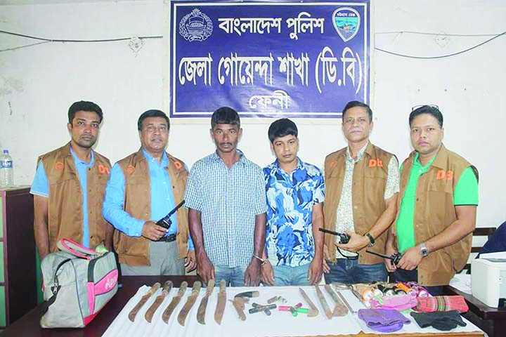 FENI: Two robbers including inter-district robber gang leader were arrested with arms from Zero Point area in Feni on Wednesday.