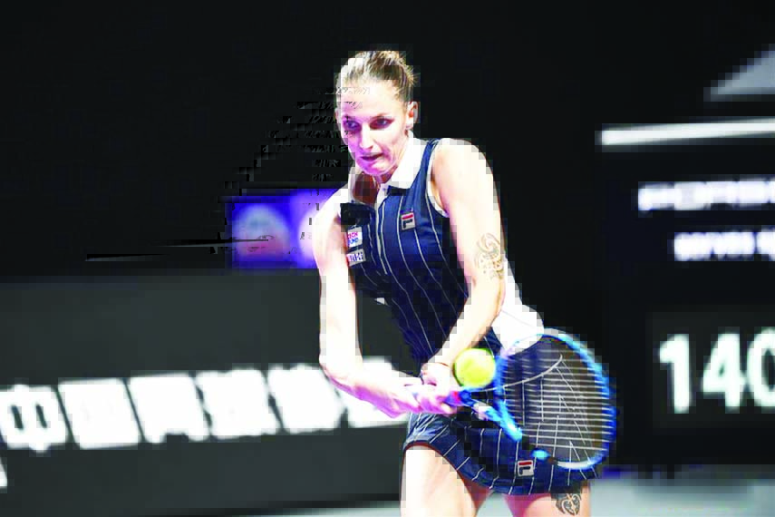 Karolina Pliskova of the Czech Republic, returns the ball during the women's singles round robin match against Simona Halep of Romania, at the WTA Finals Tennis Tournament in Shenzhen, South China's Guangdong Province on Friday.