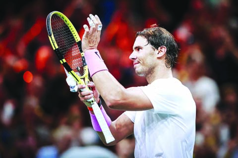 Spain's Rafael Nadal celebrates after winning against France's Jo Wilfried Tsonga in a quarterfinal match of the Paris Masters tennis tournament in Paris on Friday.