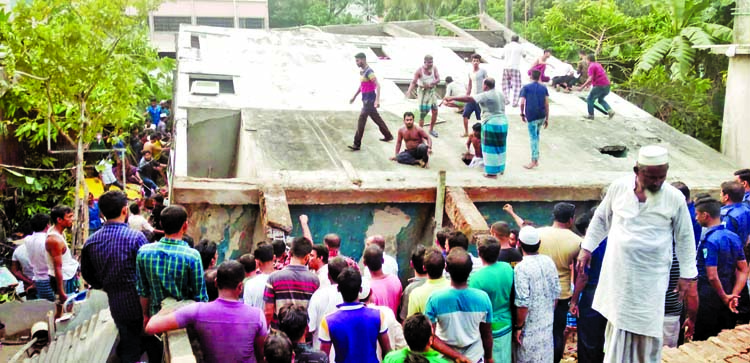 A four storey building being collapsed in Baburail area of N'ganj on Sunday afternoon. One school student was killed and many feared trapped.