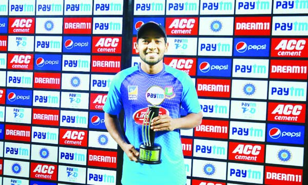 Bangladesh's Mushfiqur Rahim is all smiles after being adjudged player of the match following their first T20I against India in New Delhi on Sunday. BCB photo