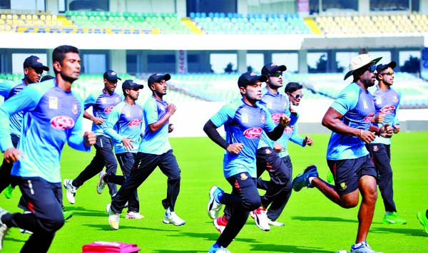 Members of Bangladesh Cricket team taking part at their practice session in Rajkot, India on Tuesday.