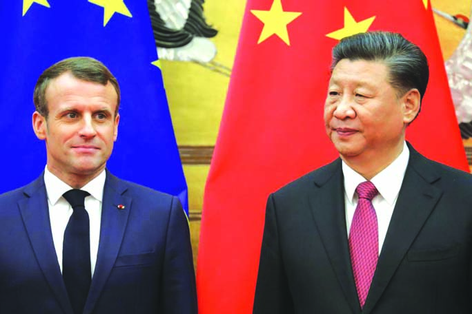 French President Emmanuel Macron and Chinese leader Xi Jinping put on a united front on the Paris climate accord after Washington pulled out.