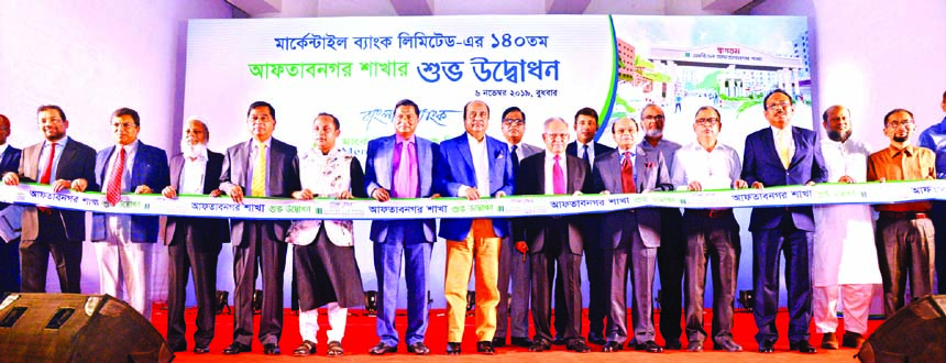 Morshed Alam, MP, Chairman of Mercantile Bank Limited, inaugurating its 140th branch at Aftabnagar in the city on Wednesday. Mosharref Hossain, M A Khan Belal, Directors, Md. Quamrul Islam Chowdhury, Managing Director, Mohd. Selim, Vice-Chairman, Shahidul