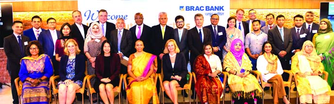 Chowdhury Akhtar Asif, DMD along with other senior officials of BRAC Bank Limited, poses for photograph with a high level delegation from World Bank (WB) Group comprising of 11 Executive Directors interacted with a group of SME entrepreneurs of the bank f
