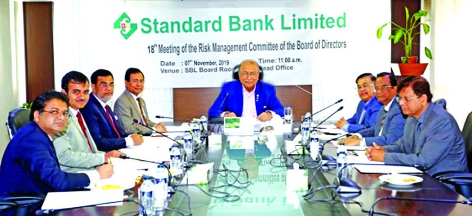 Kazi Akram Uddin Ahmed, Chairman of Standard Bank Ltd, presiding over the bank's 18th risk management meeting at its central office in the capital on Thursday. Directors Mohammad Abdul Aziz, SAM Hossain, Managing Director (Acting) Nazmus Salehin, CEO Md