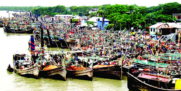 Fishing boats and trawlers are being anchored near the coastal areas as the cyclonic storm "Bulbul"" over the Bay heading towards Bangladesh. This photo was taken from Kalapara coast in Potuakhali on Friday."
