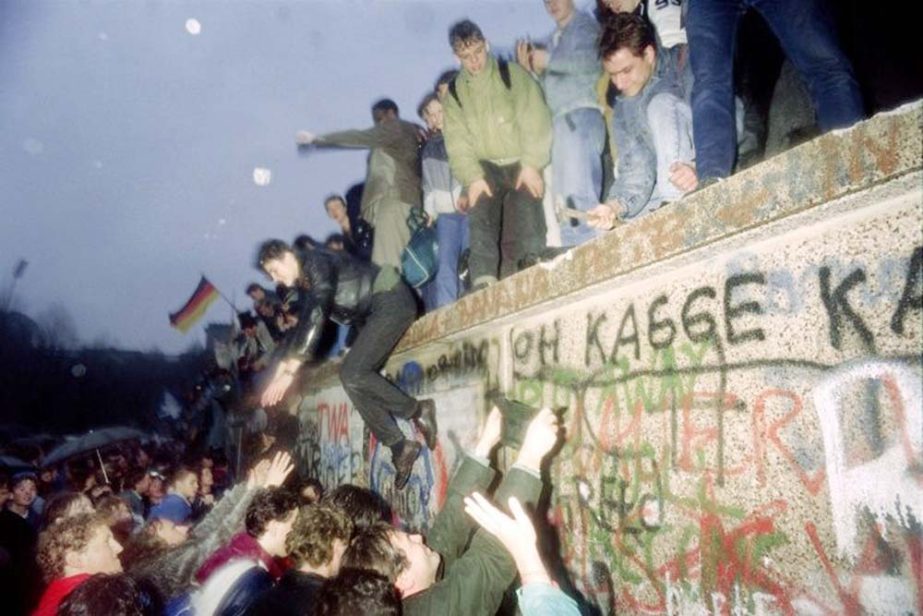 The fall of the Berlin Wall brought the Communist regime crashing down and led to German reunification a year later.